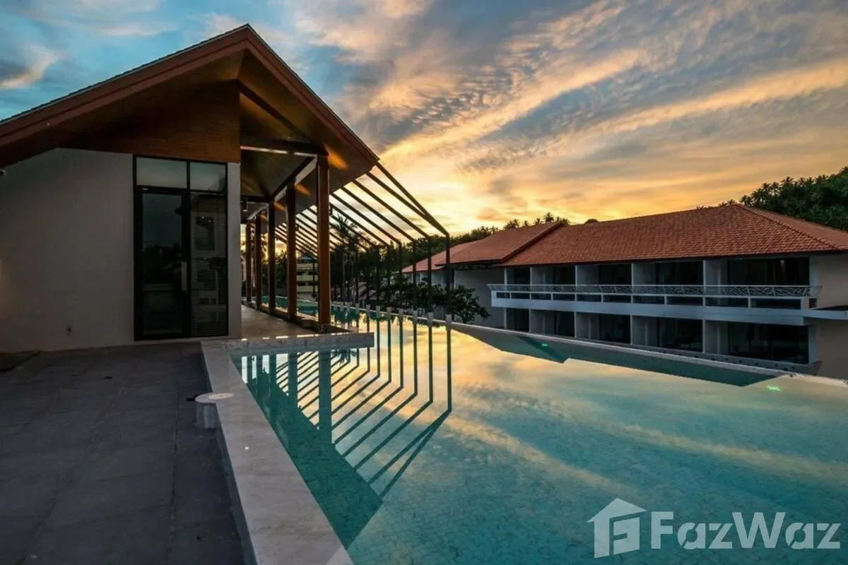 Palmyrah Surin Beach Residence · Palmyrah Surin Beach Residence · Бассейн на крыше на закате